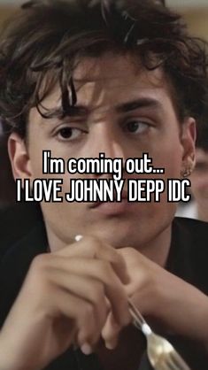 a man holding a knife and fork with the words i'm coming out i love johnny depp ic