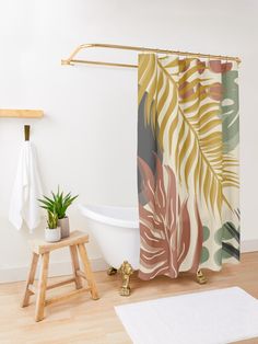 a bath tub sitting next to a wooden stool in a bathroom with a shower curtain