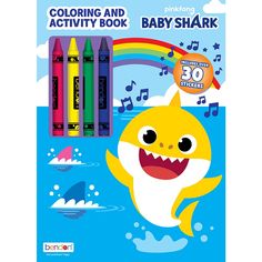 the coloring and activity book for baby shark is in front of colorful crayons