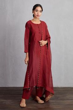 Garnet red long kurta with all-over dori work embroidery. Comes with handwoven chanderi salwar and silk organza dupatta.
Component: 3
Embroidered
Neckline: Round
Sleeve Length: Long
Fabric: Kurta and Pant: Handwoven Chanderi; Kurta: Cotton Voile; Dupatta: Silk Organza
Color: Red

Button placket - Aza Fashions Karva Chauth, Red Kurta, Kurta Cotton, Garnet Red, Red Embroidery, Indian Textiles, Organza Dupatta, Embroidered Neckline, Silk Organza