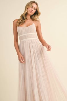 Pleated layered maxi dress. Criss cross straps, back zipper closure. Tulle skirt and nude lining underneath. Material: 100% POLYESTER Layered Maxi Dress, Tulle Maxi Dress, Lotus Jewelry, Nude Dress, Pregnant Woman, Cozy Knits, Cross Straps, Tulle Dress, Bridal Collection