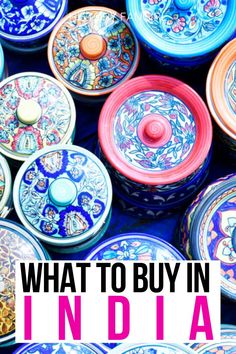 many colorful bowls with the words what to buy in india on top and bottom text overlay