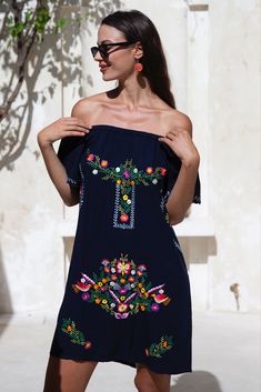 Exclusively designed embroidery adds an extra special touch; an exceptional addition to your summer wardrobe, blending folkloric details with an easy carefree style. #shortdress #embroidery #embroiderydress #dress #womensclothing Embroidered Beach Cover-up Dress For Beach Season, Folk-style Embroidered Dress For Vacation, Shoulder Embroidery, Beach Embroidered Dress With V-neck And Embroidered Hem, Embroidered Multicolor Beach Cover-up Dress, Embroidered Short Sleeve Beach Cover-up Dress, Carefree Style, Womens Short Dress, Dress Off Shoulder