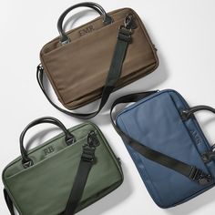 Crafted from nylon, with soft vegan leather accents, this water-resistant briefcase keeps your laptop and work essentials secure and dry, rain or shine/all year around. A commuter's dream, it features comfortable carrying handles, a removable shoulder strap, two pockets for organization, a padded laptop sleeve that fits up to a 16" laptop, and a trolley passthrough for easy travel. Add an embroidered monogram to make it stand out.    15"w x 2.5"d x 11.5"h  Polyester, neoprene, rubber, vegan leather (polyurethane), and matte black hardware.  Handle drop: 4.5"  Detachable strap: 32.5"-58.5"l  Front open pocket with a snap button closure:15"w x 9"h  Back outer zip pocket with a trolly sleeve: 10"w x 8.5"  Interior padded laptop sleeve: Fits an up to 16" laptop.  Wipe with a damp cloth.  Impor Modern Nylon Briefcase With Luggage Sleeve, Rectangular Coated Canvas Briefcase With Top Handle, Rectangular Briefcase With Top Carry Handle For On-the-go, High-end Travel Briefcase With Detachable Handle, Rectangular Briefcase With Luggage Sleeve For On-the-go, Neoprene Bag, Work Essentials, Matte Black Hardware, Briefcase For Men