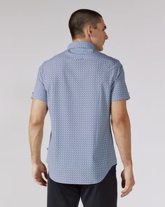 We created the perfect short sleeve button up, with the right mixture of comfort and style, just for you. Our performance shirts have 4-way stretch, are moisture wicking, wrinkle resistant and above all a great new addition to your wardrobe. The performance shirt will be your go-to for any occasion - day to night. This is a shirt that will have you satisfied at any given time. Details Model is 6'1" and wears a size medium. Care: Machine wash cold on delicate cycle with similar colors. Do not use Casual Cotton Shirt With 4-way Stretch, Fitted Blue Short Sleeve Camp Shirt, Blue Fitted Short Sleeve Camp Shirt, Casual Short Sleeve Shirt With 4-way Stretch, Blue Short Sleeve Top With 4-way Stretch, Blue 4-way Stretch Short Sleeve Tops, Short Sleeve Flannel, Flannel Shorts, Short Hoodie