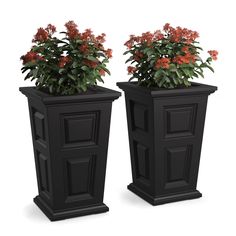 two black planters with flowers in them on a white background, one has red and the other is green