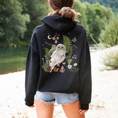 "You haven't found your favorite zip hoodie until you've got this. Mystical and unique, this Nature inspired Floral Snowy OWL Aesthetic Zip Up Hoodie is everything you've dreamed of and more. It feels soft and warm, with the right amount of stretch. It's comfortable and flattering for all.  Embrace the warmth in style. Work Your Magic! Instead of worrying about what you cannot control, shift your energy to what you can create. Be the reason someone smiles. Be the reason someone feels loved and believes in the goodness in people. It's perfect phase to shine! This Magical Cottagecore Sweater makes a perfect choice for all my Fairies, Good Witches and Nature Lovers out there, for all who into fairy grunge and goblincore style clothing. For all who loves whimsical and \"lagniappe\" (a little s Snowy Owl Aesthetic, Aesthetic Zip Up Hoodie, Owl Aesthetic, Cottagecore Sweatshirt, Owl Hoodie, Cottagecore Nature, Cottagecore Sweater, Full Zip Up Hoodie, Aesthetic Cottagecore