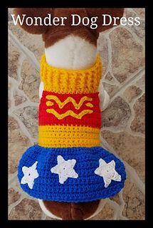 a stuffed dog wearing a crochet wonder costume