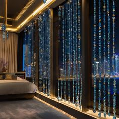 the bedroom is decorated with blue beads and glass bead curtains that are hanging from the ceiling