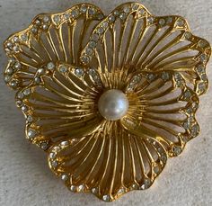 Rachel Designer brooch. 22kt gold plated w Pearl and handset Swarovski crystals.  Made in Canada. Lead and Nickel free.  New piece Designer Brooch, Jewelry Board, Jewelry Boards, Favorite Jewelry, Brooch Pin, Brooches, Swarovski Crystals, Gold Plate, Handmade Items