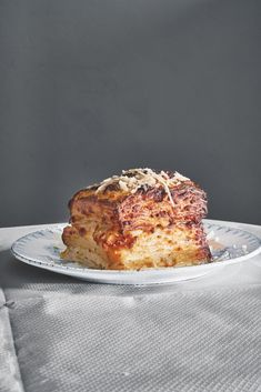 a piece of cake sitting on top of a white plate