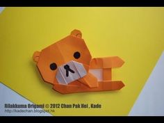 an origami bear made out of paper