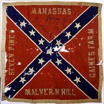 an old flag that has been hung on the wall