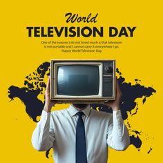 a man in a tie holding an old tv over his head with the words world television day written on it