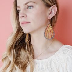 These Remedy earrings are perfect for any BOHO fashion lover! The beautifully colored threads woven with a glimmery golden fiber amongst the rustic hardware create the perfect blend of beauty and fashion. You are sure to turn heads and feel confident all day wearing these stunning earrings. Colorful threaded drop earrings add the perfect pop to any outfit. Measures approximately 2.75 inches. Weighs approximately .3 ounces *Colors may vary depending on screen calibration. Rustic Hardware, Earrings Colorful, Triangle Earrings, Gold Threads, Stunning Earrings, Everyday Earrings, Beauty And Fashion, Gorgeous Earrings, How To Feel Beautiful