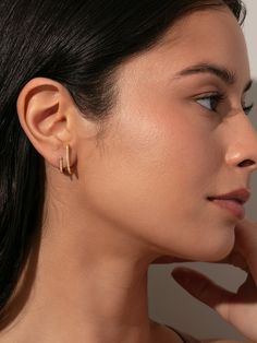 Stay ahead of the trend with our Double Vision Ear Climber that’ll definitely turn heads. These climber earrings are designed with a two-in-one illusion, appearing to be two separate linear stud earrings from the front when really you only need one piercing. Not only are these the suspender style you’ve been looking for, but our original style is even decorated with cubic zirconia for a bit of added glitz. Did we mention they also come in Sterling Silver? | Gold Solid Double Vision Ear Climber E Trendy Everyday Ear Climbers, Minimalist Everyday Ear Climbers, Double Vision, Ear Climbers Earrings, Kristin Cavallari, Ear Climbers, Climber Earrings, Zodiac Necklaces, Selling Jewelry