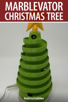 a christmas tree made out of green plastic with the words marbelvator christmas tree