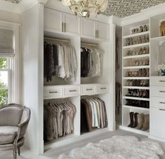 the closet is full of clothes, shoes and other things to wear in this room