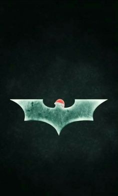 the dark knight rises poster with batman symbol on it's chest and red ball in his mouth