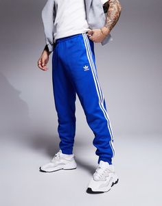 Pants & Chinos by adidas Originals For 'no plans' plans Elasticated waistband Side pockets Adidas branding Fitted cuffs Skinny fit Men Loungewear, Adidas Branding, Adidas Brand, Compression Tights, Sweatshirt Fabric, Maxi Dress Trend, Adidas Samba, Hoodies For Sale, Plus Size Pregnancy