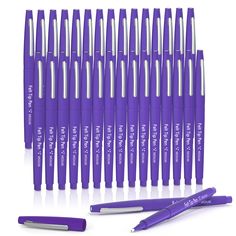 the purple pen is lined up next to each other and it's full of pens