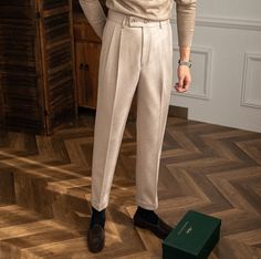 Introducing our Italy High Waist Trousers, a sartorial tribute to the timeless elegance of Old Money style. Tailored specifically for the sophisticated man, these trousers encapsulate an air of refined charm and stately sophistication. These trousers are meticulously crafted from premium, high-grade polyester - a fabric chosen for its durability and lightweight feel. Comfortable yet resilient, this material ensures these trousers maintain their tailored look throughout the day. With easy care an Fitted Beige Dress Pants For Formal Occasions, Luxury Tapered Leg Dress Pants For Semi-formal Occasions, Formal Wide Leg Bottoms For Winter, Classic Winter Office Bottoms, Wide-leg Bottoms For Winter Formal, Formal Full-length Bottoms For Winter, Full Length Formal Bottoms For Winter, Formal Winter Trousers Pants, Formal Winter Trousers