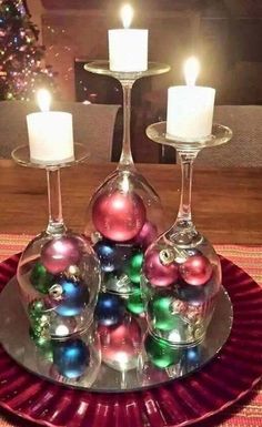 wine glasses upside down with ornaments as candles