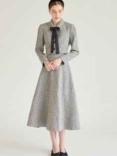 Editor's notesThis tweed skirt features relaxed, flare silhouette in maxi length. Subtle pearly texture adds to the feminine, romantic mood. - Lightweight tweed fabric- Voluminous A-line silhouette- Comfortable side pockets- Casual yet luxurious styleMeasurements(in.)Size (32(XS) / 34(S) / 36(M) )- Waist: 12.20 in / 13.19 in / 14.17 in - Length: 31.10 in / 31.3 in / 31.5 in * Model info: Height 5' 7, wearing Size 34Composition & Care- 10% Acrylic, 90% Polyester - Dry Cleaning only Designer- by IvanaHelsinki Winter Midi-length Tweed Dress, Winter Midi Length Tweed Dress, Elegant Tweed Skirt For Formal Occasions, Chic Houndstooth Tweed Dress, Fall Midi-length Tweed Dress, Formal Tweed Skirt For Fall, Formal Fall Tweed Skirt, Elegant Tweed Skirt For Fall, Spring Tweed Dress With Houndstooth Pattern