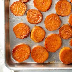 cooked sweet potatoes on a baking sheet ready to be baked