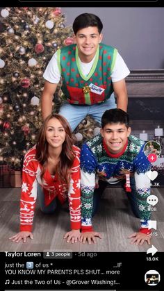 two people are posing in front of a christmas tree with the caption taylor loran