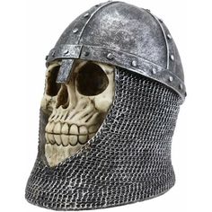 This medieval knight of heraldry is reduced to a skull but as a warrior, he rests in this coffin with his battle helmet and mail head coif. he is a great decorative piece for any medieval knight or skull lovers! The Holiday Aisle® | The Holiday Aisle® Medieval Knight Skull w / Helmet & Head 6.25 H x 6.25 W x 4.75 D in blue / gray / white | 6.25" H X 6.25" W X 4.75" D | Wayfair Arthurian Tattoo, Gothic Helmet, Skull With Helmet, Bone Armor, Dark Deco, Knight Helmet, Medieval Tattoo, Dragon Bones, Antique Phone