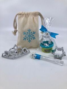 an assortment of kitchen utensils, including cookie cutters and snowflake