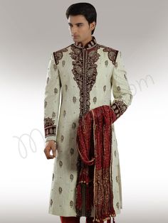 Amer Groom Designer Sherwani White Traditional Wear With Pearl Embroidery For Festive Occasion, Festive White Traditional Wear With Pearl Embroidery, Embroidered Anarkali Sherwani For Reception, Kundan Churidar With Intricate Embroidery For Wedding, White Traditional Wear With Pearl Embroidery For Diwali, Traditional Cream Sets With Pearl Embroidery, Anarkali Style Raw Silk Sherwani With Zari Work, Wedding Traditional Wear In Raw Silk With Pearl Embroidery, Anarkali Style Sherwani With Resham Embroidery In Art Silk