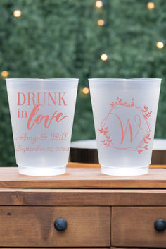 Clear frosted plastic cups personalized for weddng with Drunk in Love design and custom text on front side and geo wedding wreath monogram initial on back side in coral print Personalized Cups For Wedding, Customized Cups For Wedding, Personalized Wedding Cups Receptions, Personalized Shot Glasses Wedding Favors, Mason Jar Cups Drinking Glass Wedding Favors, Wedding Drinks Reception, Wedding Cups Personalized, Custom Plastic Cups, Wedding Plastic Cups