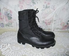 Black leather and cloth military combat boots. Cool Chunky ripple soles. Leather on the bottom of the boots and cloth / canvas around the ankles. The heel of the insole reads "Made in China." There is some dirt on the soles and some general wear, but overall they look good and are ready to wear! Size marked: 6 Wide -- see measurements to ensure fit. My guess is that this is Men's sizing, but see measurements.   Measurements are in inches.  Inner sole length: 10 Inner sole width, ball of foot: 3.5 Follow @lunarhovel on instagram for new items posted every week and sale announcements! International customers - I will not mark items as a gift on the customs form - this is illegal and I as the seller will be the one punished if found out, hence, I refuse to do this for anyone. You are responsi Military Combat Boots, Ankle Boots, Military Combat, Goth Punk, Hot Weather, Vintage Clothing, Combat Boots, Vintage Outfits, Shoe Boots