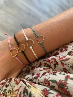 Small bracelet with heart charm in stainless steel * Choose the thread color of your choice * All bracelets are adjustable 〰️ Do not hesitate to contact me for further information and possibly customization of the model and/or colors 🤍 * DELIVERY 📦 Shipping within 5 days maximum, Creations made to order Follow me on the networks 🌷: Instagram: BijouxLettyM Facebook: Letty M Jewelry Gift idea for birthday, Christmas, Valentine's Day, Mother's Day, etc. Adjustable Metal Heart Bracelet For Valentine's Day, Adjustable Heart-shaped Metal Charm Bracelet, Adjustable Heart-shaped Metal Bracelets, Adjustable Pink Stainless Steel Charm Bracelet, Dainty Adjustable Stainless Steel Charm Bracelet, Adjustable Heart-shaped Stainless Steel Charm Bracelet, Adjustable Heart Shape Stainless Steel Charm Bracelet, Adjustable Dainty Stainless Steel Charm Bracelet, Adjustable Metal Bracelets For Valentine's Day