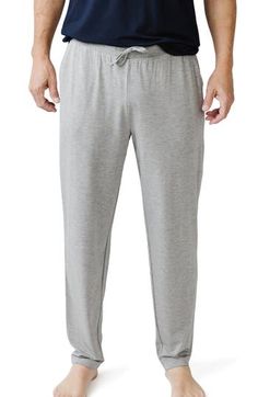 Enjoy a luxurious sleep in these breathable PJ pants crafted from moisture-wicking fabric with a comfy drawstring waist. Moisture-wicking fabric engineered for dryness and comfort   95% viscose, 5% spandex   Machine wash, tumble dry   Imported   OEKO-TEX®–certified materials free of harmful substances Relaxation Activewear With Elastic Waistband, Sleepwear With Pockets For Loungewear, Comfortable Long Pants Activewear For Lounging, Comfort Waistband Activewear For Lounging, Solid Cotton Sleepwear With Elastic Waistband, Joggers With Comfort Waistband For Relaxation, Moisture-wicking Loungewear Pants, Comfortable Sleepwear With Pockets, Activewear With Elastic Waistband For Lounging