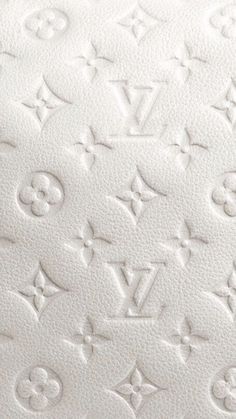 the white louis vuitton logo is shown on this mattress