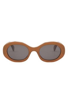 A sleek oval silhouette elevates Italian-made sunglasses fitted with scratch-resistant CR-39 lenses. 52mm lens width; 22mm bridge width; 145mm temple length 100% UV protection CR-39 lenses Acetate Made in Italy Celine Triomphe, Brown Brown, Eyewear Womens, Oval Sunglasses, Eyewear Sunglasses, Light Brown, Uv Protection, Temple, Lenses