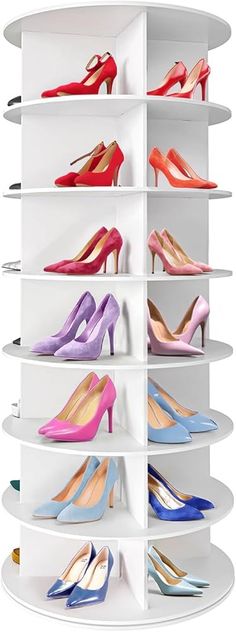 the shoe rack is filled with many pairs of high - heeled shoes, all in different colors