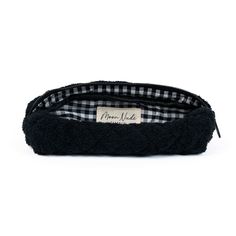 Our Space Pencil Case is a cute and stylish pouch designed to hold your stationery or brushes with a classic look.   The quilted black towel exterior is soft and luxurious, complemented by the elegant black & white gingham interior.  Ideal for storing your makeup brushes & eyeliners, or your pens & pencils (perfect for students), this bag is a must-have for those who appreciate both organization and style.  Size: 9" x 2" x 3" Gingham Interior, Storing Makeup Brushes, Makeup Brush Case, Mini Makeup Bag, Large Makeup Bag, Black Towels, Tool Bags, Vanity Bag, Mini Makeup