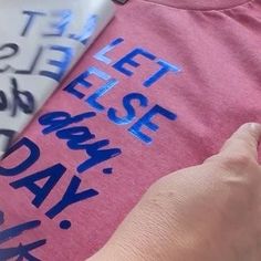 someone is cutting out the letters on a t - shirt that says leftover day