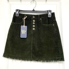 Indigo Rein, Dark Green, Corduroy, Raw Hem, Button Front, Mini Skirt. Size 0/23. Nwts Yellow Denim Skirt, White Jean Skirt, Yellow Mini Skirt, Distressed Skirt, Yellow Denim, Corduroy Mini Skirt, Button Up Skirts, White Mini Skirt, Skirt Y2k