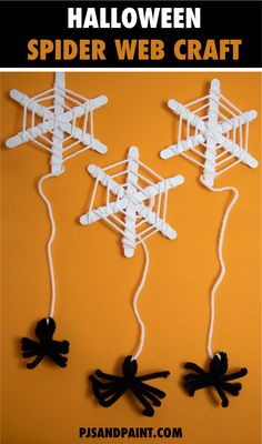 halloween spider web craft for kids with black and white string attached to the strings, on an orange background