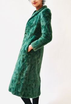 "Stunning 90s Glam Mink Fur Coat from the early 1990s for Henri Bendel New York! * Constructed in dyed mink in a gorgeous rich Green ready to brighten your wardrobe * Sheared pieced mink fur * Notched collar * front hook and eye closure * Slightly extended shoulders * gorgeous slimming fit with fit slim sleeves and body * Fully lined with green lining * Absolute perfection FUR: pieced DYED MINK Great vintage condition Across shoulder 13 1/2\" Bust 30\" Waist 28\" Hip 36\" Body length from Should Fitted Long Green Outerwear, 90s Glam, Long Fur Coat, Green Leather Jackets, Fringe Leather Jacket, Mink Fur Coat, Sequin Jacket, Rich Green, Metallic Dress