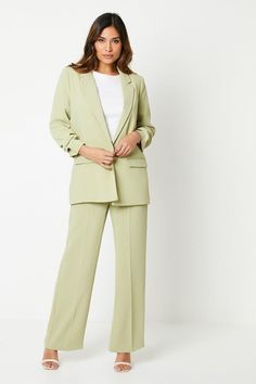 Sophisticated single-breasted blazer with ruched sleeve detailing
Structured tailoring for a smart, polished silhouette
Notched lapels and welt pockets lend a refined finish
twill fabric with a smooth, crisp handfeel
Fully lined for a luxurious drape and comfortable wear
Exuding effortless sophistication, this blazer is a versatile wardrobe staple for the modern woman. Pair it with tailored trousers and heels for a chic office ensemble or dress it down with jeans and trainers for a smart casual weekend look. The ruched sleeve detail adds a touch of feminine flair, making it a stylish choice for evening events or special occasions when you want to look polished and refined. Look Polished, Single Breasted Blazer, Petite Jumpsuit, Petite Coat, Ruched Sleeve, Versatile Wardrobe, Tall Clothing, Chic Office, Floral Outfit