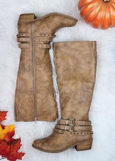 A classic and oh-so trendy boot style for fall! These stylish beauties are comfortable, full calf zip with an elastic expander for added comfort! These boots measure a 14" calf and are true to size.