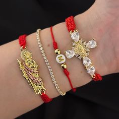 This set of 4 adjustable bracelets is a must-have for anyone who loves to accessorize. The set includes a San Judas bracelet, a Virgen cross bracelet, a tennis adjustable bracelet, and an initial bracelet. All of the bracelets are adjustable, making them suitable for wrists ranging from 6.5" to 11". The San Judas bracelet is a symbol of faith and protection, making it a great addition to any outfit. The Virgen cross bracelet is a beautiful piece of jewelry that can be worn on any occasion. The s Keychain Necklace, Set Bracelet, Initial Bracelet, Cross Bracelet, Anklet Bracelet, Gold Plated Bracelets, Evil Eye Necklace, Evil Eye Bracelet, Evil Eye Jewelry