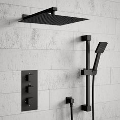 thermostaer, shower head and handset in black with white wall tiles