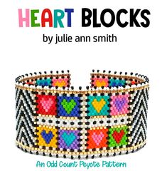 a bracelet made out of beads with hearts on it and the words heart blocks by julia ann